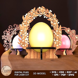May include: A wooden Easter egg stand with a floral design. The stand has three tiers, each with a different coloured egg. The stand is made for laser cutting.