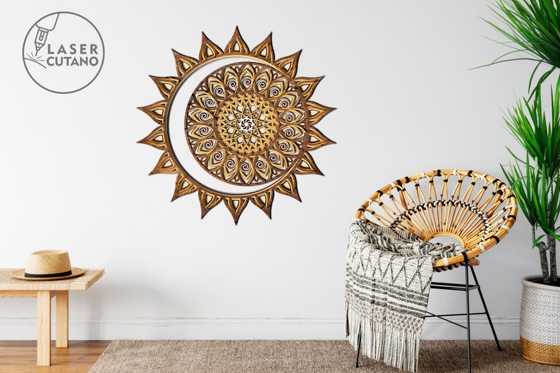 May include: A wooden sun and moon mandala wall decor with intricate details. The mandala is made of layered wood and has a brown and gold color scheme.