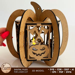 May include: A wooden pumpkin-shaped lantern with a jack-o'-lantern face and axe design. The lantern is made of laser-cut wood and has a candle inside. The design includes the text "DIGITAL FILES FOR LASER CUT" and "3D MODEL".