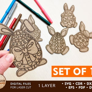 May include: Set of 10 laser cut wooden Easter bunny ornaments. Each bunny is holding an egg decorated with a bow and hearts. The ornaments are unfinished and ready to be painted.