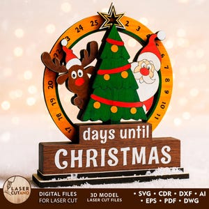 May include: Wooden Christmas countdown calendar featuring a reindeer, Santa Claus, and a Christmas tree. The calendar has a circular design with numbers and the text "days until CHRISTMAS". Includes the text "DIGITAL FILES FOR LASER CUT".