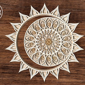 May include: A white, intricate mandala design with a sunburst pattern, cut from wood. The mandala is set against a brown wood background.