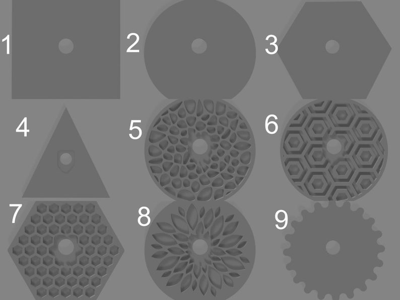May include: Nine different gray shapes with a hole in the center. The shapes include a square, circle, hexagon, triangle, and various patterned circles.