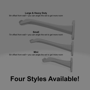 May include: Three grey wall-mounted brackets in varying sizes. The Large & Heavy Duty has a 9in offset, the Small has a 7in offset, and the Mini has a 5in offset from the wall. Each bracket features an angled design. Text reads: Four Styles Available!