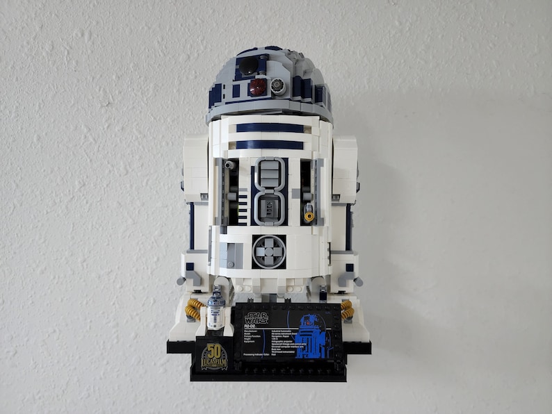 Wall mount for LEGO R2-D2 75308 wall mounted display with plaque and minifigure on black floating shelf