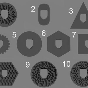 May include: A collection of ten dark gray geometric shapes labeled one through ten, each featuring a central shield-shaped cutout. The shapes include circles, a rectangle, a triangle, a gear, a hexagon, and a square, with various textures.
