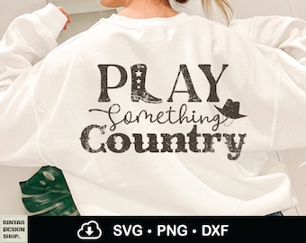May include: White sweatshirt with a distressed black graphic that says "Play Something Country" with a cowboy boot and hat graphic.