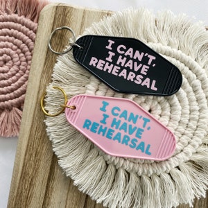 I can't I have rehearsal motel keychain, theater fan keychain