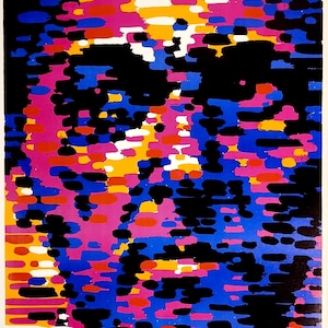 May include: A rectangular poster featuring a stylized portrait composed of horizontal brushstrokes in black, blue, pink, orange, and white. Text at the top reads WITKACY, GALERIA TEATRU NOWEGO w WARSZAWIE, and 1885-1985. Bottom text includes PLAKATY Z KOLEKCJI JANUSZA GUNI.