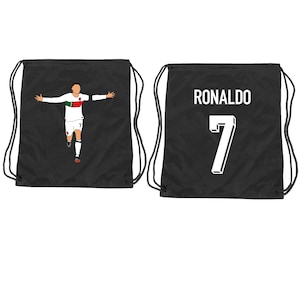 May include: Two black drawstring bags with white text and a graphic. One bag has the text "RONALDO" and the number "7". The other bag has a graphic of a soccer player celebrating a goal.