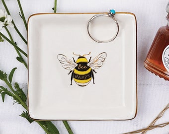 De bijenringschotel in geschenkverpakking