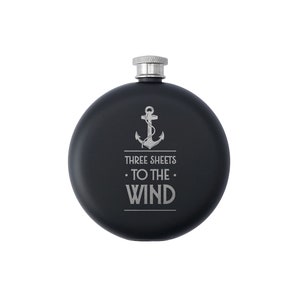 May include: Black flask with a silver lid and an engraved anchor with the text "Three Sheets To The Wind".
