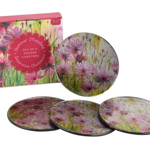 May include: Set of four square glass coasters with a floral design. The coasters feature a watercolor-style illustration of pink flowers and green foliage. The box says "Summer Meadows Set of 4 Square Coasters Decorative Glassware".