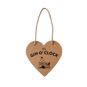 May include: A cork heart-shaped sign with a string for hanging. The sign says "It's Gin O'Clock" and has a small illustration of a bottle of gin and a gin and tonic.