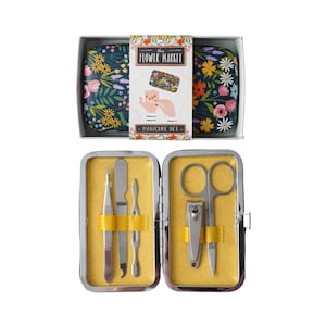 May include: A floral patterned manicure set in a compact case. The case is open to reveal a nail clipper, tweezers, a cuticle pusher, and nail scissors.
