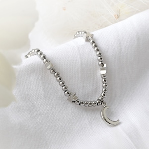 Bracelet étoile et lune en perles avec carte-cadeau