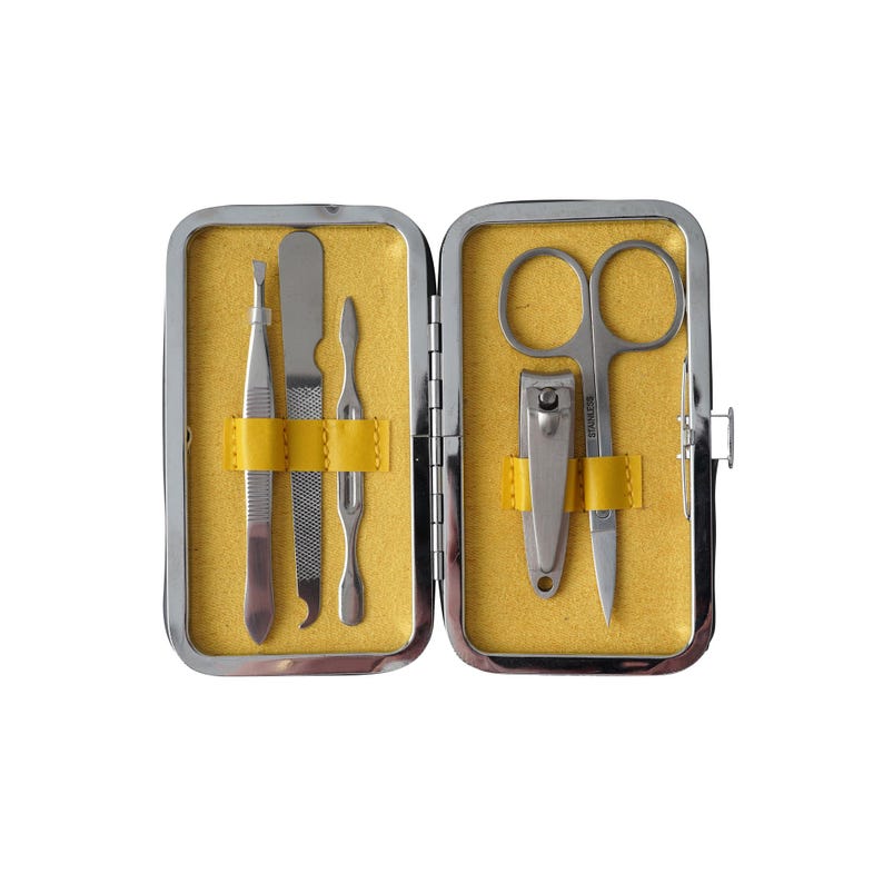 May include: A silver manicure set with a nail clipper, tweezers, a cuticle pusher, a nail file, and scissors. The tools are in a yellow and silver case.