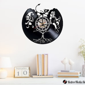 Vinyl Record Clock featuring Disenchanted cartoon characters Luci, princess Bean, Elfo - Matt Groening Cartoon design Clock