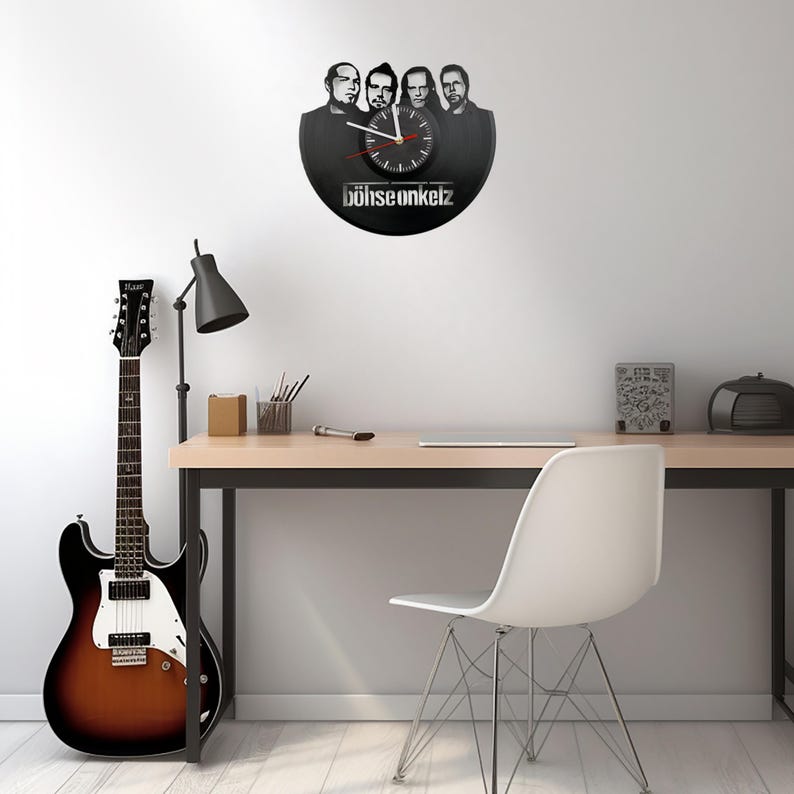 Böhse Onkelz vinyl record clock with band portrait cutout, silent quartz clock movement, and silkscreen dial illustrated with feature icons.