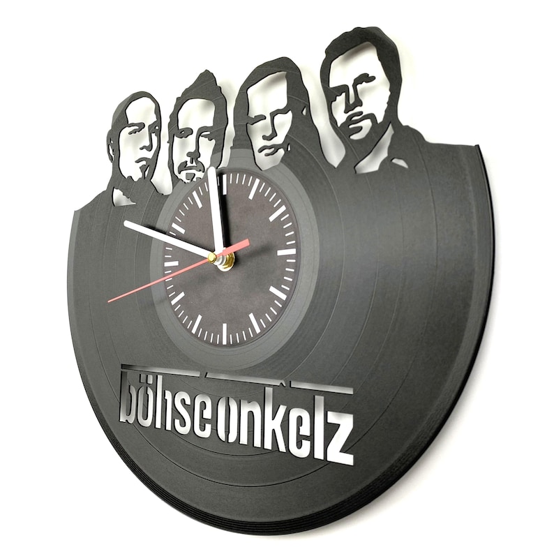 Angled view of Böhse Onkelz vinyl record clock highlighting grooves, band silhouette cutout, and precision clock hands.