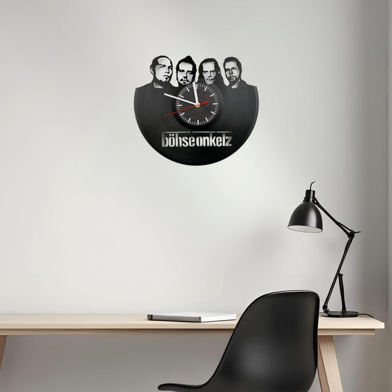 Böhse Onkelz vinyl record clock with band portrait cutout, silent quartz clock movement, and silkscreen dial illustrated with feature icons.
