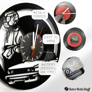 May include: A black vinyl record clock featuring a silhouette of a person welding a car. The clock has a metallic pointer and is battery operated with AA batteries. The clock is easy to hang on the wall.