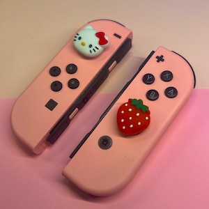 Hello kitty & Strawberry Thumb Grips – Kawaii Joystick Covers | Nintendo Switch OLED | Soft Silicone Caps