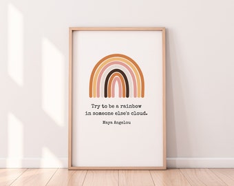 Könnte beinhalten: Ein gerahmter Druck mit einer Regenbogenillustration und dem Zitat "Versuche, ein Regenbogen in der Wolke eines anderen zu sein." von Maya Angelou.