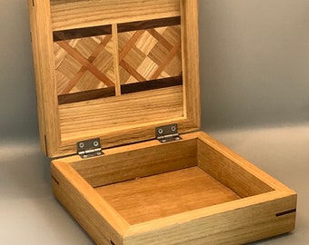 Exquisite handmade ornamental box of mixed hardwoods