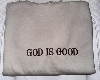 Sudadera con capucha bordada "Dios es bueno"