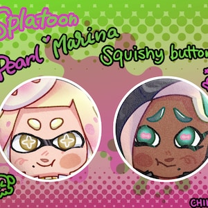 Pode incluir: Dois botões redondos, coloridos e de estilo cartoon com os personagens Pearl e Marina do videogame Splatoon. O texto "Splatoon Pearl Marina Squishy buttons" está na parte superior da imagem.