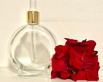 3,4 oz (100ml) Gevormde helderglazen fles met gouden serumdruppelaar, parfumfles, etherische oliefles