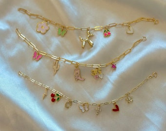 Surprise Charm Bracelet, give us your social handles and we will create a charm bracelet based on you!