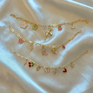 Surprise Charm Bracelet, give us your social handles and we will create a charm bracelet based on you!