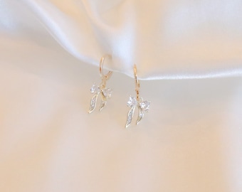 Gold bow huggie earrings | dangly bow earrings | stacking earrings | bow charm earrings | tiny bow earrings earrings | sparkly bow Huggies |