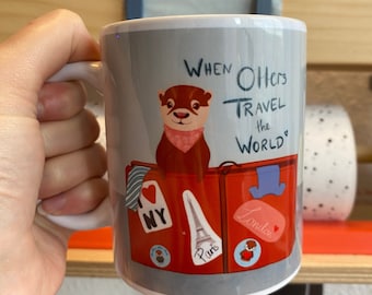 Otter mug with the motif "When Otters Travel the World" | Ceramic cup | cute gift printed by hand