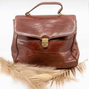 Vintage OROTON brown leather satchel style bag - made in Australia - genuine leather - gold accents - top handle