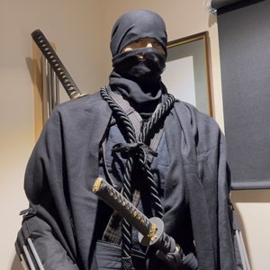 Traje de guerrero de las sombras