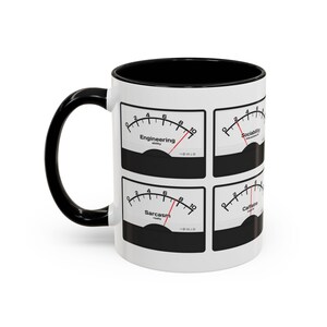 May include: White ceramic mug with a black handle and interior. The mug features four gauge designs labelled "Engineering", "Sociability", "Sarcasm", and "Caffeine". Each gauge has a needle indicating a level of intensity.
