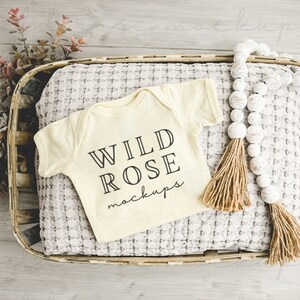 Natural Baby Bodysuit Mockup, Folded Onesie Mock, Blank Rabbit Skins, Baby Vest Mock-Up Stock Photo, Onesie Flat Lay