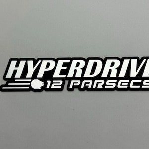 Car Badge Star Wars Millennium Falcon 12 parsecs Themed, Car Badge brushed silver or gold (Not a Sticker) - Laser Cut with 3M Auto Adhesive