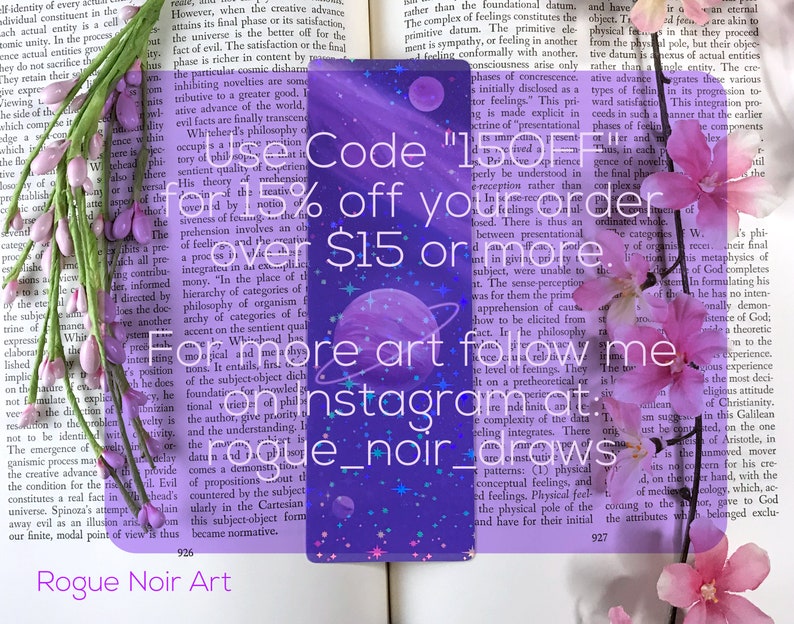 May include: A purple and blue galaxy-themed bookmark with a holographic finish. The bookmark features a code for a discount on orders over $15. The text on the bookmark reads "Code "15OFF" off your order $15 or more. For more art follow me on instagram: rogue_noir_draws".