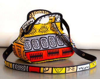 Quilted wax handbag with adjustable shoulder strap: the Graphic Comic