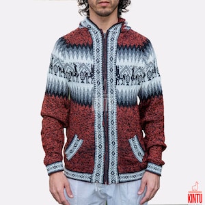 May include: A red, black, and white hooded sweater with a zipper closure and a geometric pattern featuring llamas. The sweater has two pockets and a drawstring hood.