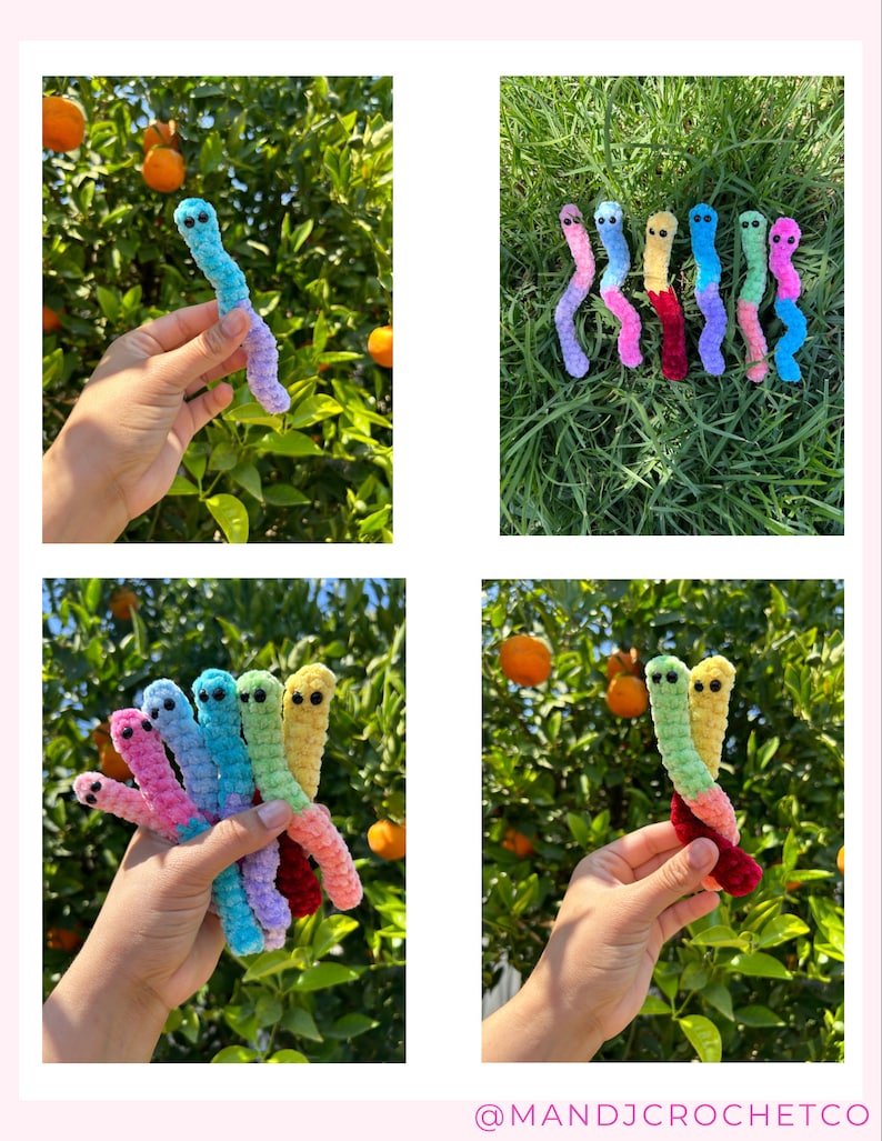 May include: A set of colorful crocheted worm plushies in various colors, including pink, blue, green, yellow, and red. The worms have black eyes and are arranged in a group on a bed of green grass.