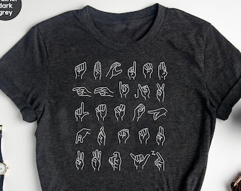 May include: A heather dark grey t-shirt with a white outline of the American Sign Language alphabet printed on the front.