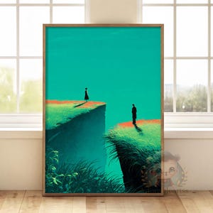 May include: Framed art print featuring two silhouetted figures standing on opposite cliffs. The artwork has a teal sky, green and red grassy cliffs, and a wooden frame. The overall theme is surreal and minimalist.