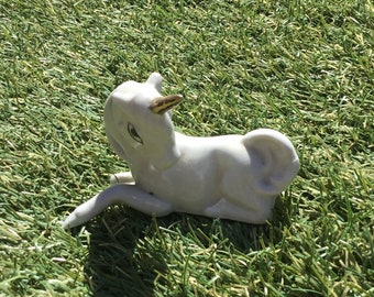 Vintage, collectible porcelain unicorn from 1980’s with gold color horn