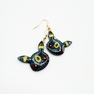 Umbre Eeve Poke Dangle Earrings