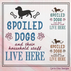 May include: Embroidered design with the text "Spoiled Dogs and their household staff live here" in blue and brown. The design features a dachshund silhouette and paw prints.